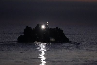 Ten British anti-migrant activists banned from entering France