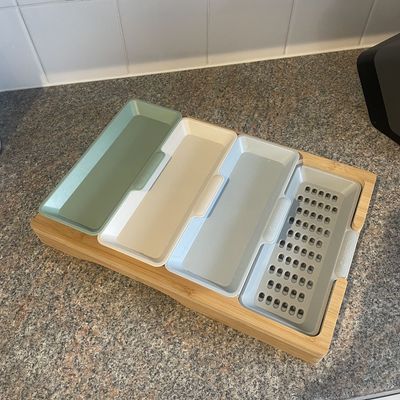 My friends all thought this compartmented chopping board was super expensive – it's actually a genius £7.99 Aldi star buy