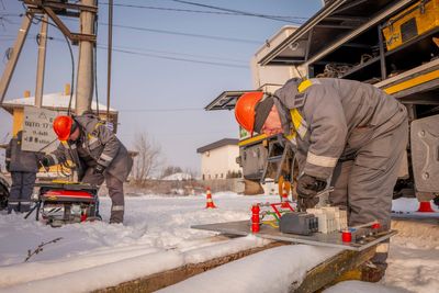 Ukrainians endure freezing temperatures at home as emergency crews rush to restore power