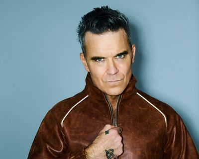 Robbie Williams: Britpop review – a wayward yet winning time-machine trip back to the 90s