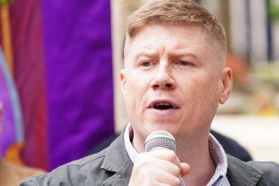 Union boss ‘held up communist flag alongside people singing pro-Russia chants in occupied Ukraine’