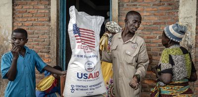 International aid groups are dealing with the pain of slashed USAID funding by cutting staff, localizing and coordinating better