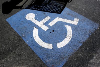 Woman with disability sues Florida over new law that allows pregnant women to park in accessible spaces