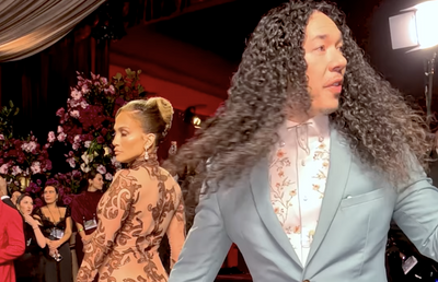 JLo Slammed For 'Cold' Interaction' With Glambot Guy Cole Walliser During Golden Globes Red Carpet