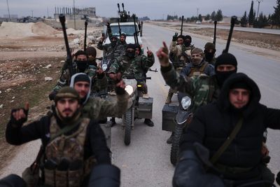 Syrian government forces enter northern towns after Kurdish fighters withdraw