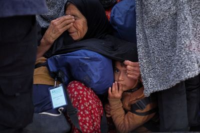 Photos show Syrians returning home following clashes between government forces and Kurdish fighters
