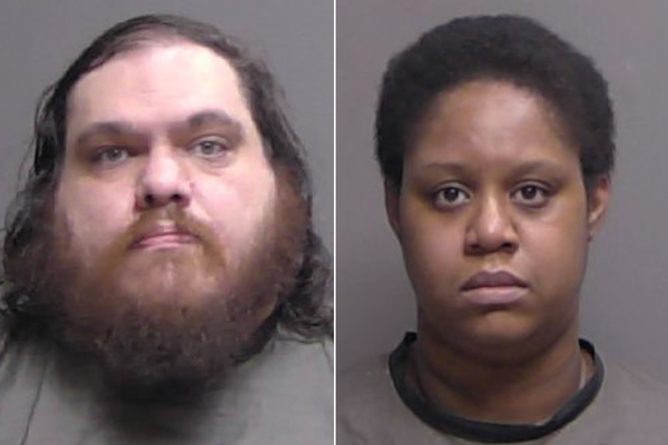 Parents charged after baby found covered in roaches despite mother’s ‘protective’ circle of Raid, police say