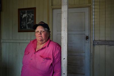 The road to Trish’s Queensland farm was blown up for a coalmine – now flood waters have left her ‘stuck in a hole’