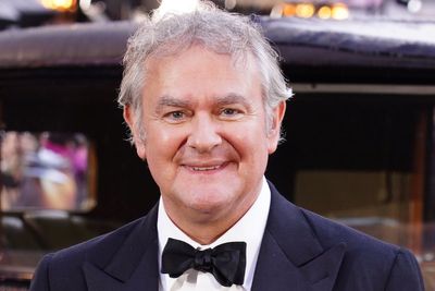 Hugh Bonneville is 'blessed to start a new chapter' after end of 25 year marriage and teases Paddington future