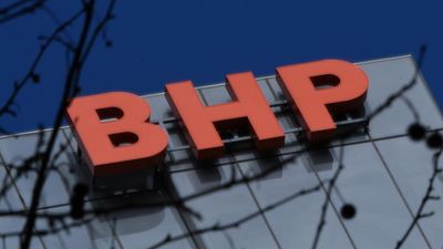 BHP shares dip as overspend outweighs record production