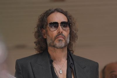 Russell Brand appears in court via videolink from US charged with further sex offences