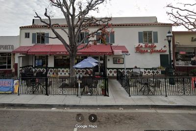 Four people arrested for using ‘variety of weapons’ to beat a man to death on the patio of a pizza restaurant 20 years ago