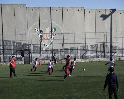 Palestinian refugees’ West Bank football pitch saved after Uefa president lobbies Israel