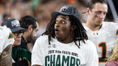 Photo of Ed Reed and His Big Hat Consoling Miami’s Malachi Toney Loved by CFB Fans