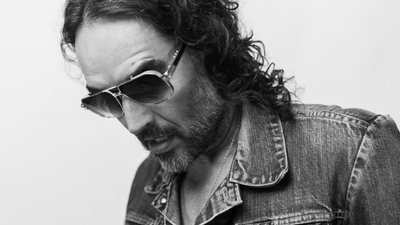 English Comedian Russell Brand Walks Free on Bail With Seven Charges — Accusers Face Possible Long Wait