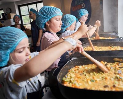 Children cook meals for needy and mourners lay wreaths for Bondi attack victims on national day of mourning