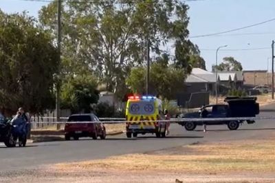 Three dead and gunman still at large after shooting in rural Australian town