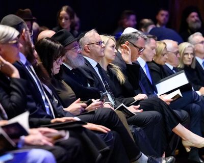 Silence marks moment of sorrow as Australians mourn victims of Bondi terror attack