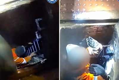 Suspected underground cable thief emerges from manhole in busy city centre