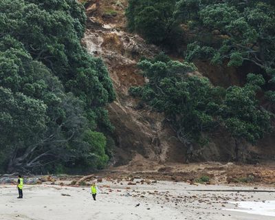 Two dead and six missing after landslides hit house and campground in New Zealand