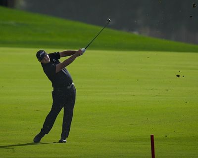 Patrick Reed unfazed by fines as he hits the front in Dubai Desert Classic