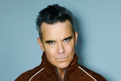 Robbie Williams breaks The Beatles’ record to make UK music history