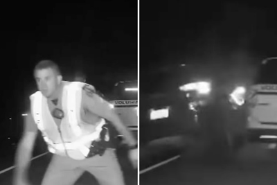 Trooper and deputy almost wiped out by car while helping stranded driver at night