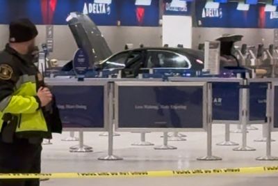 Car slams into airport entrance and hits Delta ticket counter injuring 6