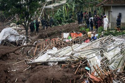 Eight dead and over 80 missing after landslide hits Indonesia village