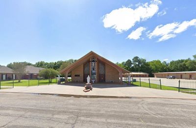 Arrested Louisiana priest was accused of ‘inappropriately touching a child’, report says