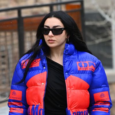 Charli XCX Swaps Her Ugg Boots and Puffer Jacket for a Saint Laurent Suit Straight Off the Runway