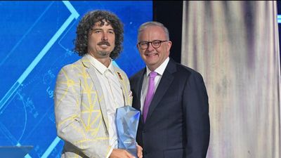 'Paying it forward': sparky honoured at national awards