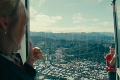 Alex Honnold stopped to check in with his wife halfway up his 1,667ft skyscraper free solo climb