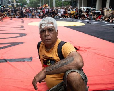 Invasion Day: police investigate ‘device’ thrown into Perth crowd as huge marches held across Australia