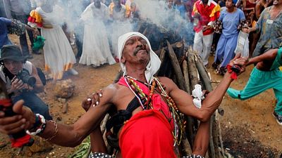 Cuba's Santeros offer gifts and ask deities for peace amid crises