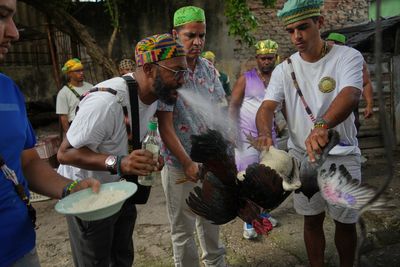 Cuba's Santeros offer gifts and ask deities for peace as tensions rise with US