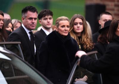 Gabby Logan grieves at father Terry Yorath's funeral as her daughter's gesture has mourners 'in tears'