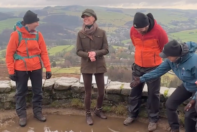 Kate laughs off mud as she braves Storm Chandra on country walk