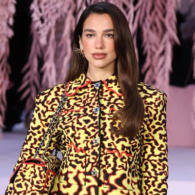 Dua Lipa Trades Neutral Tweed for a Fiery Skirt Set at Chanel's Haute Couture Show