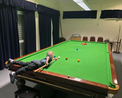Two-year-old pots two Guinness World Records with snooker trick shots