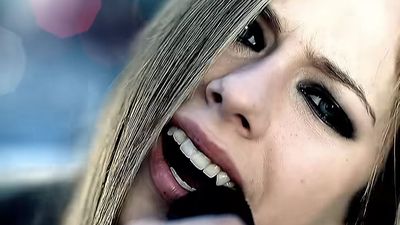 “Avril and I thought, ‘Let’s just make up the most stupid opening line for a song’”: How Avril Lavigne channeled her punk rock influences and her personal life into the monster hit she describes as “a super special song to me”