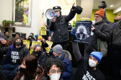 Dozens of protesters arrested at hotel in Manhattan during sit-in over immigration crackdown