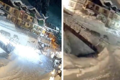 Terrifying moment avalanche engulfs homes during severe snow in northern India
