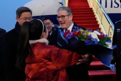 Revealed: How Chinese minder photographed inside of PM's plane and tight security on Starmer's Beijing trip