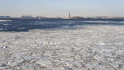 Bitter cold grips eastern US as ice forms on rivers
