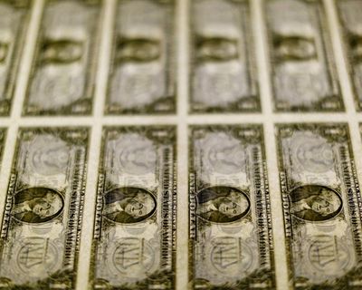 US dollar sinks to its lowest level in four years