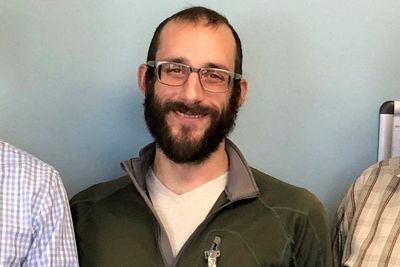 Two federal agents in Minneapolis shot at Alex Pretti. DHS report says he did not brandish his gun