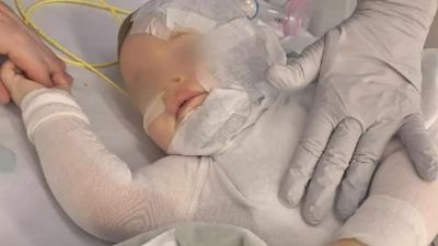 Chinese investigators to search for man who burnt baby