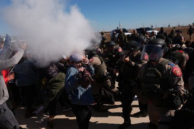 Police deploy chemical irritants at protesters gathered outside Texas detention center, in photos