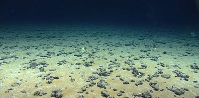 Submarine mountains and long-distance waves stir the deepest parts of the ocean